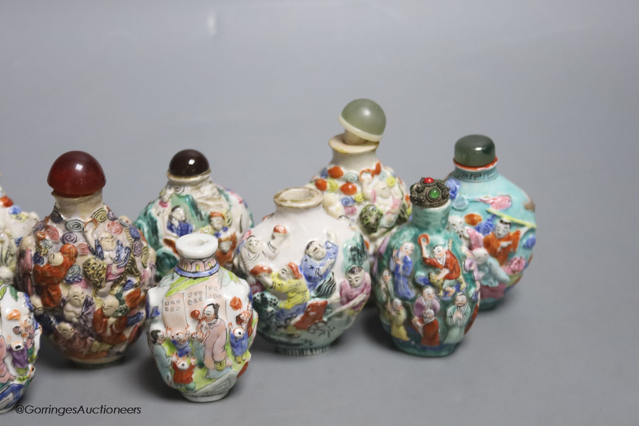 A collection of Chinese twelve famille rose snuff bottles